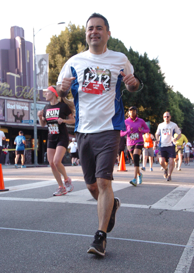 Photo of Pasadena dentist Dr. Arash Azarbal, running in the Hollywood half marathon.